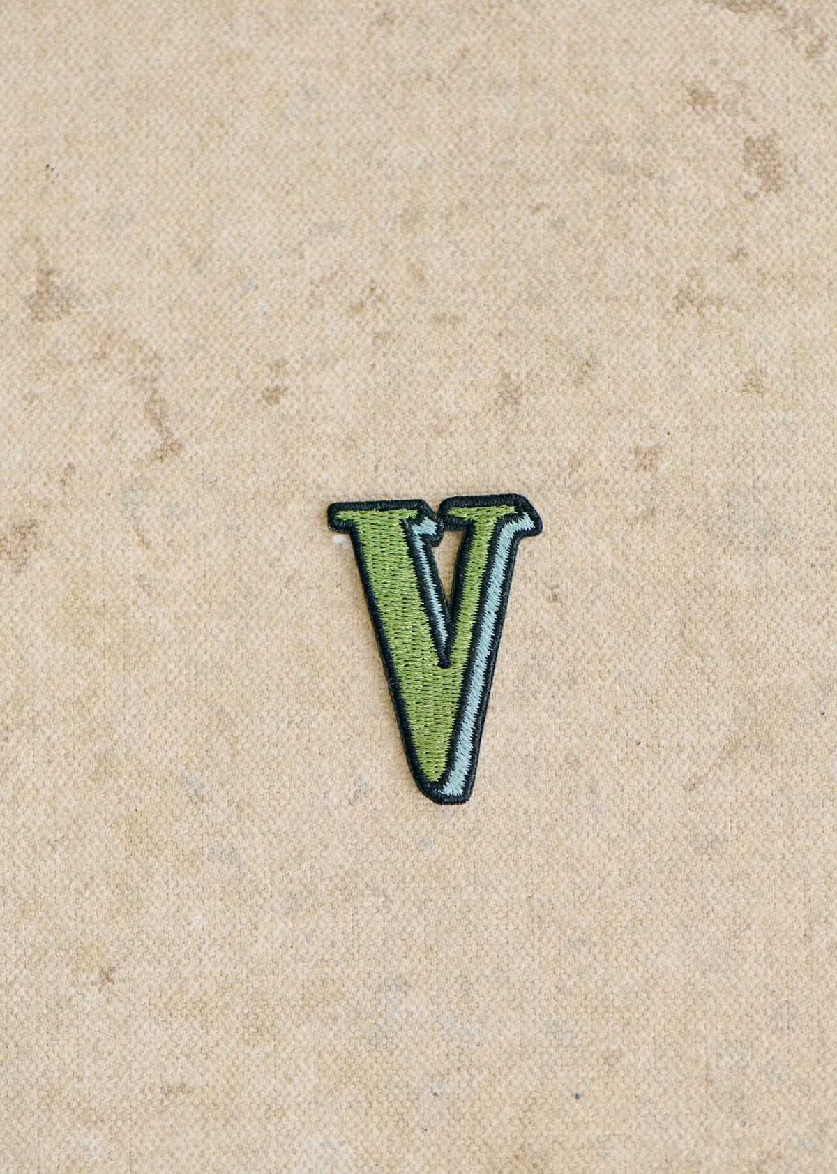 Ecusson vert / bleu - Lettre V - Vert