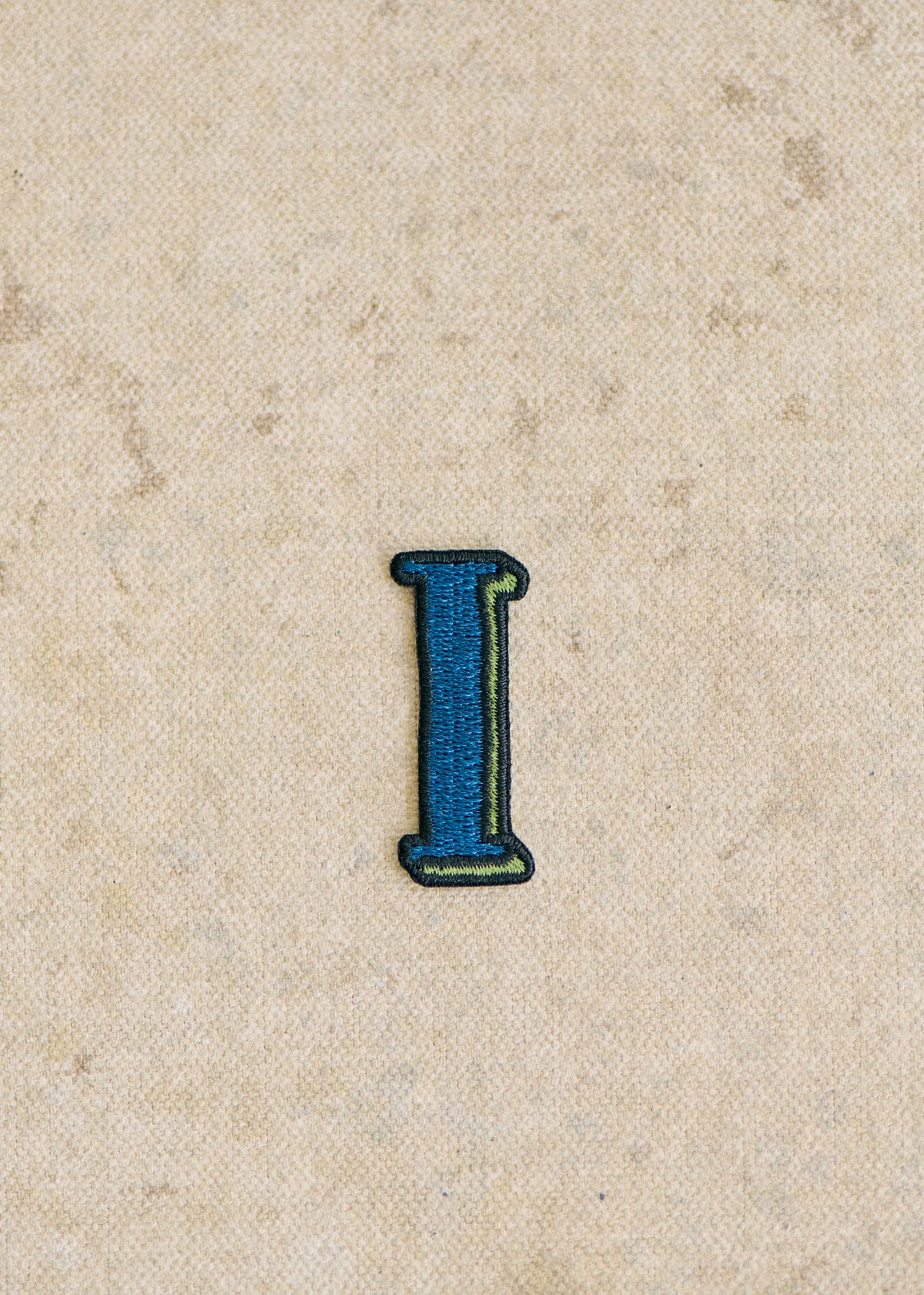 Ecusson vert / bleu - Lettre I - Bleu