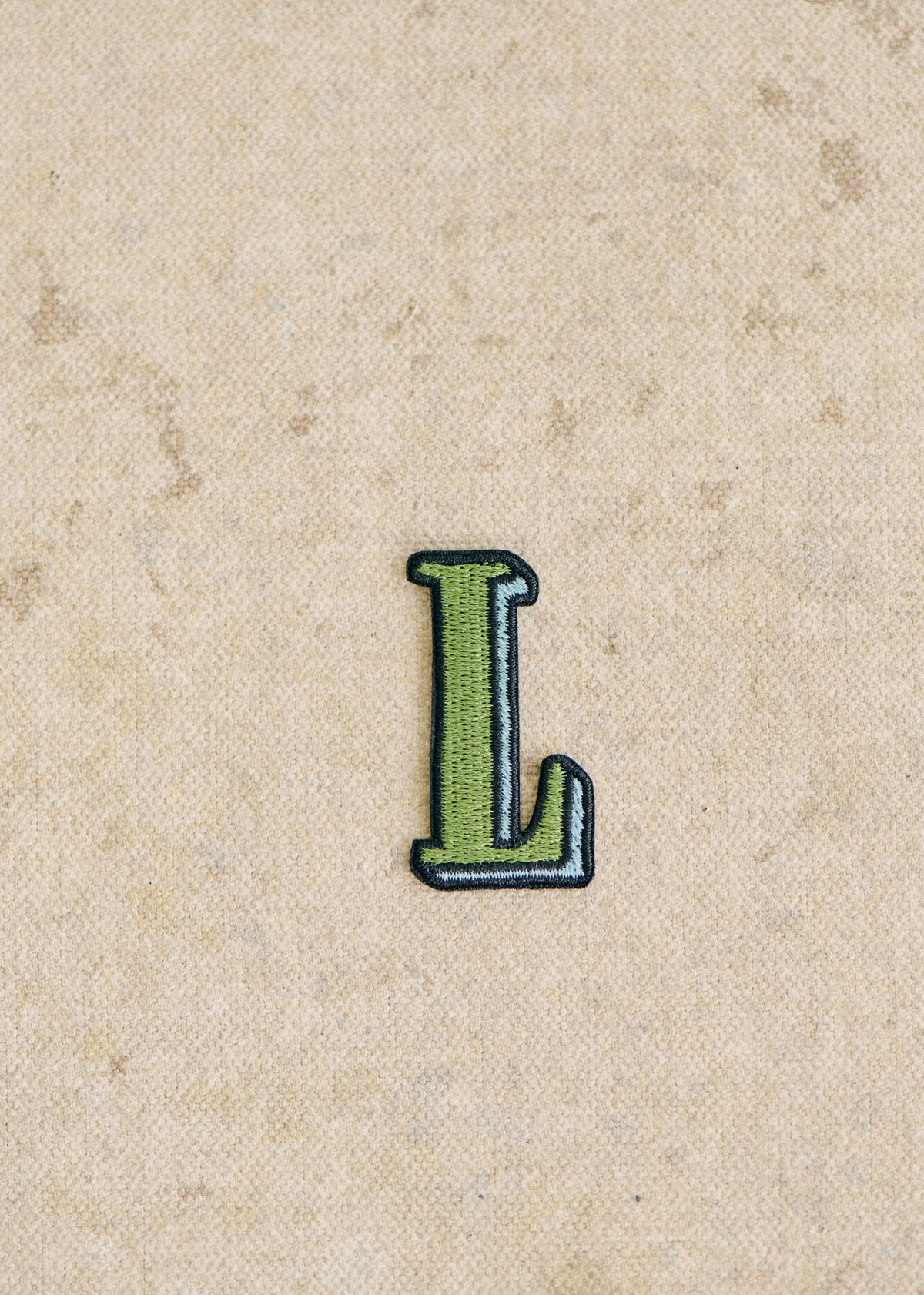 Ecusson vert / bleu - Lettre L - Vert