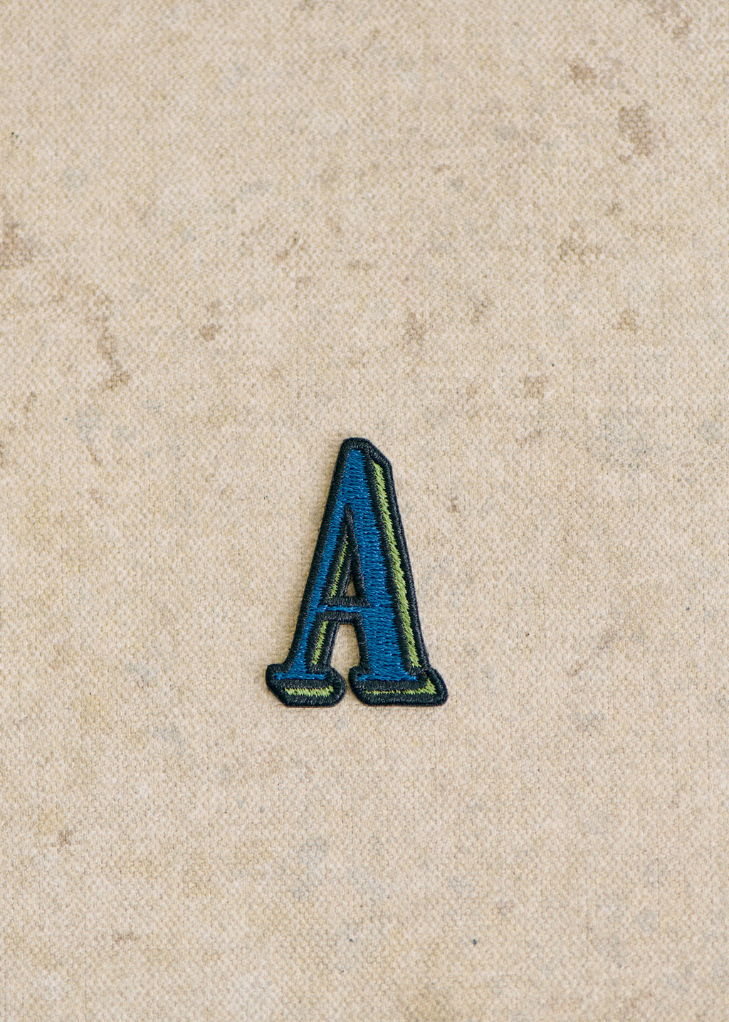 Ecusson vert / bleu - Lettre A - Bleu