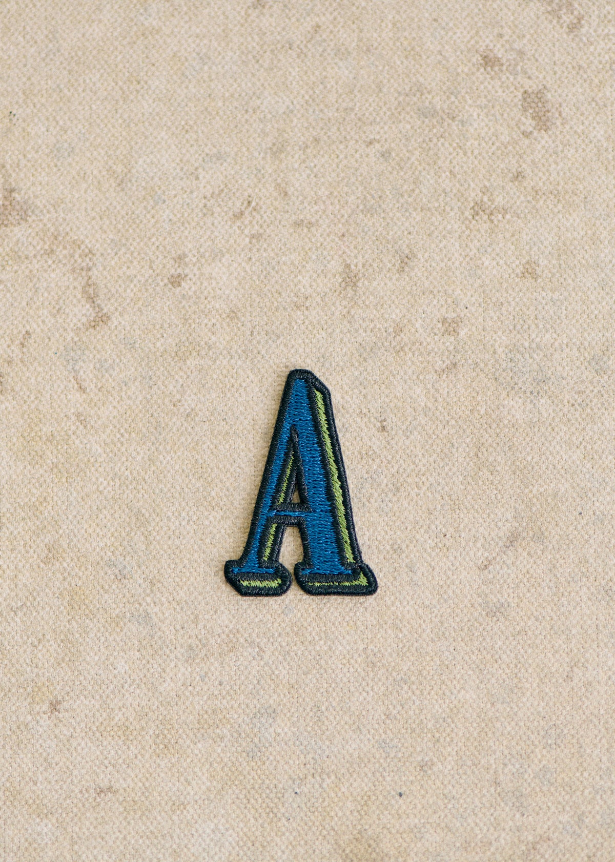 Ecusson vert / bleu - Lettre A - Bleu
