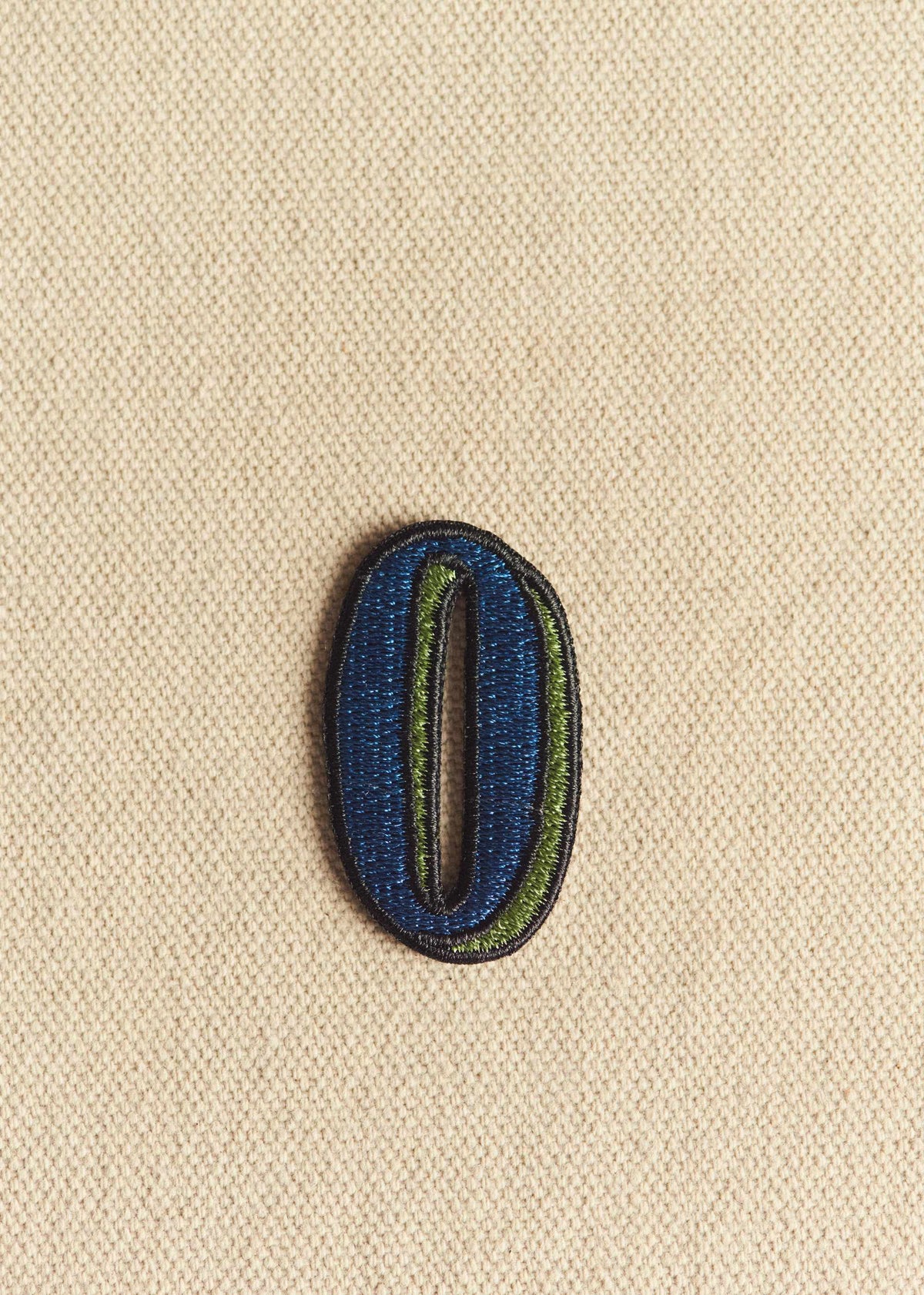 Ecusson vert / bleu - Lettre O - Bleu