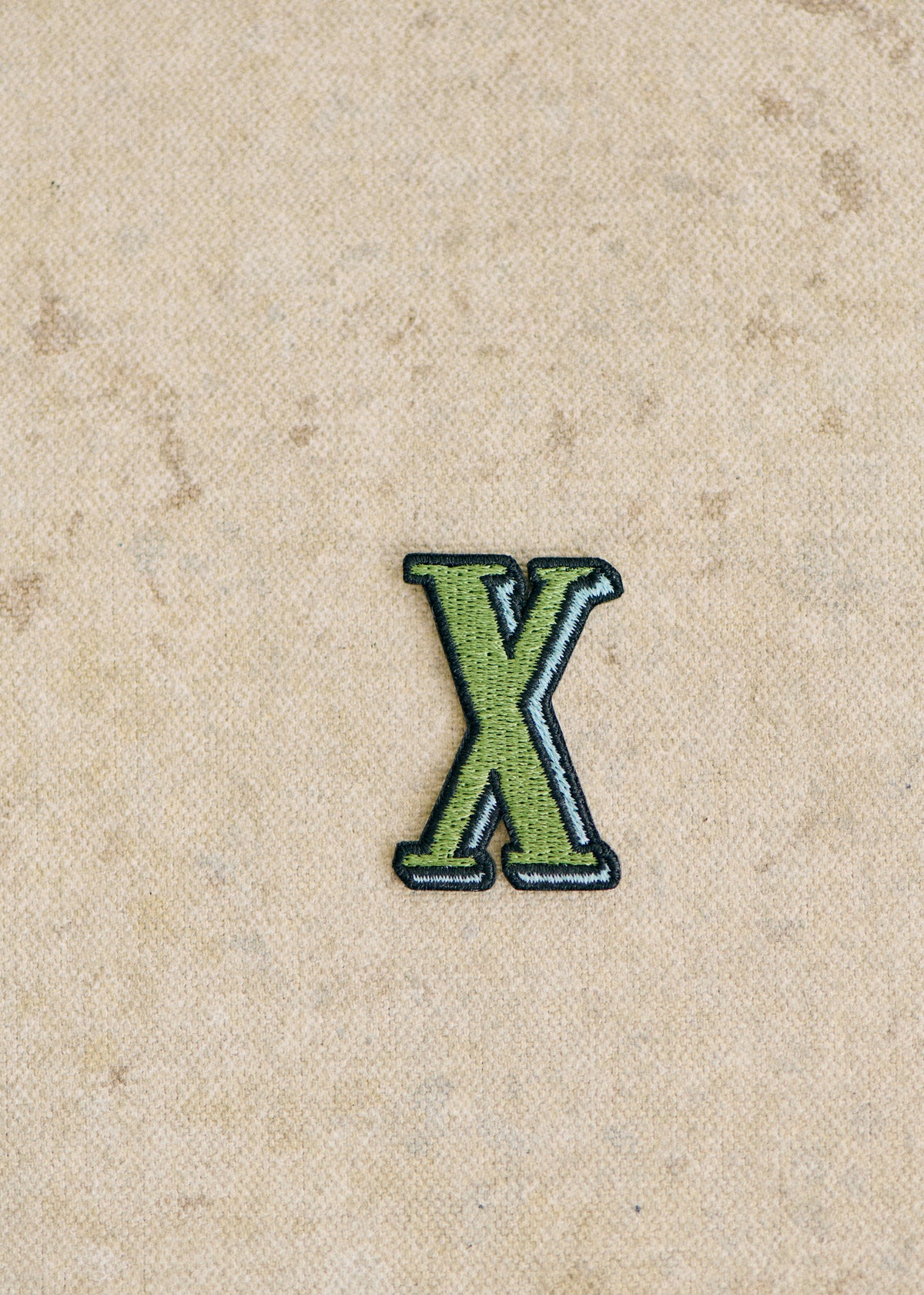 Ecusson vert / bleu - Lettre X - Vert