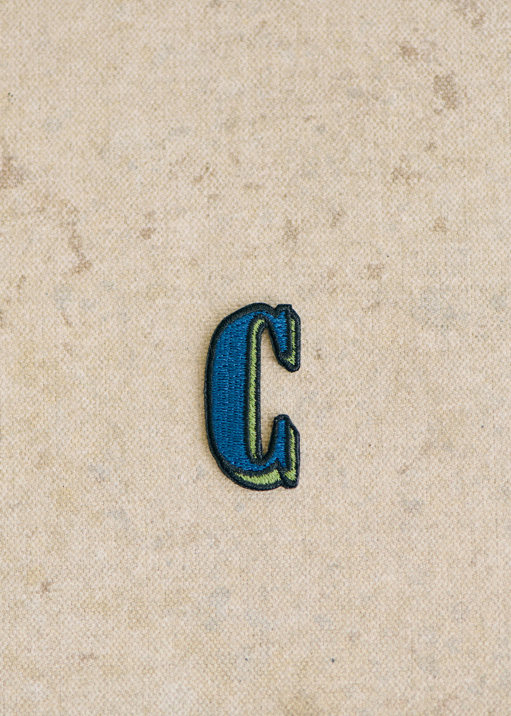 Ecusson vert / bleu - Lettre C - Bleu