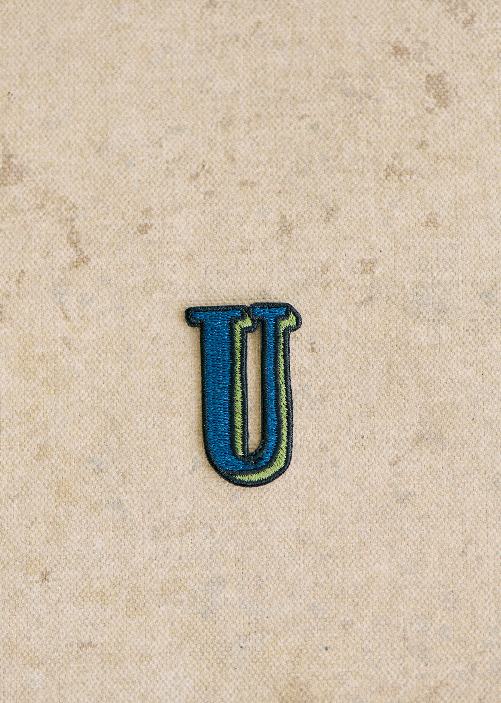 Ecusson vert / bleu - Lettre U - Bleu