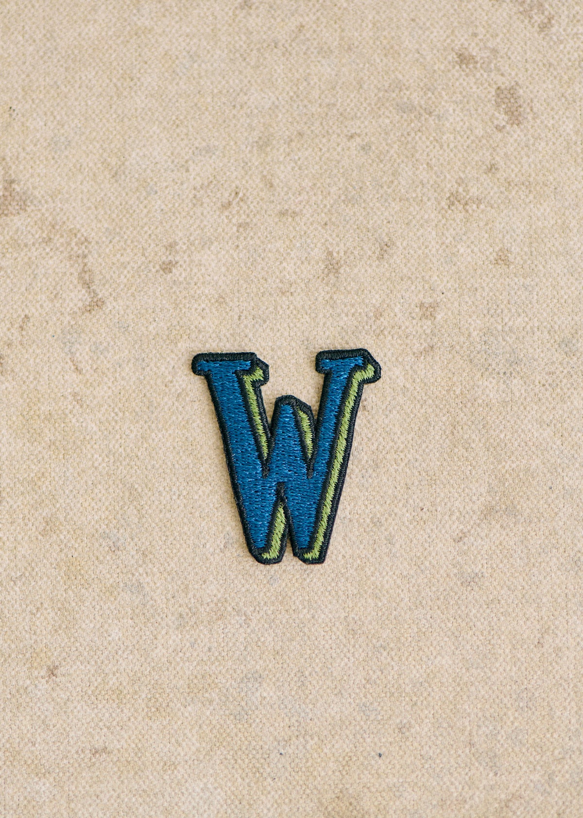 Ecusson vert / bleu - Lettre W - Bleu